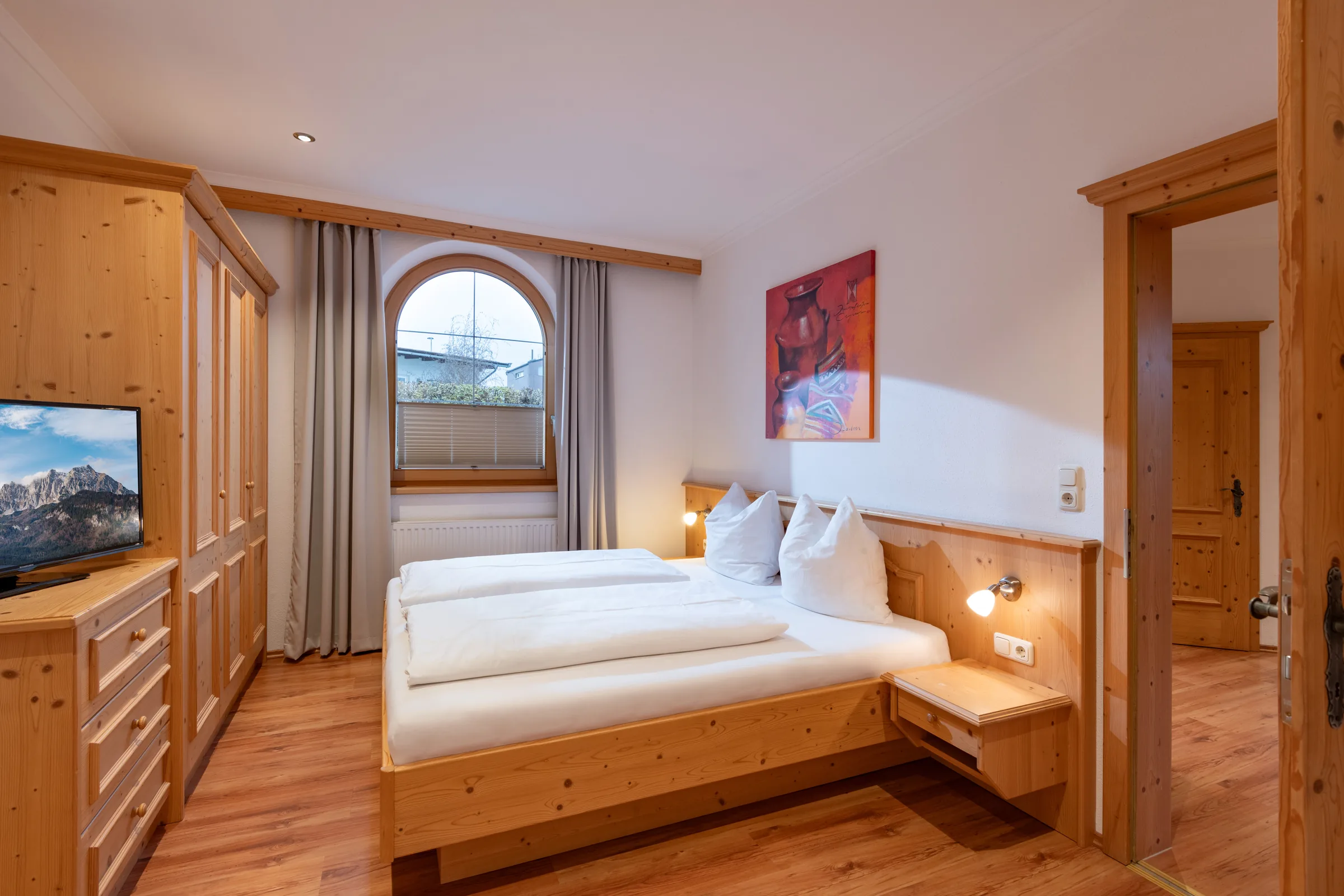 Zweites Schlafzimmer mit Doppelbett, Appartement mit Terrasse des Appartement Erler.